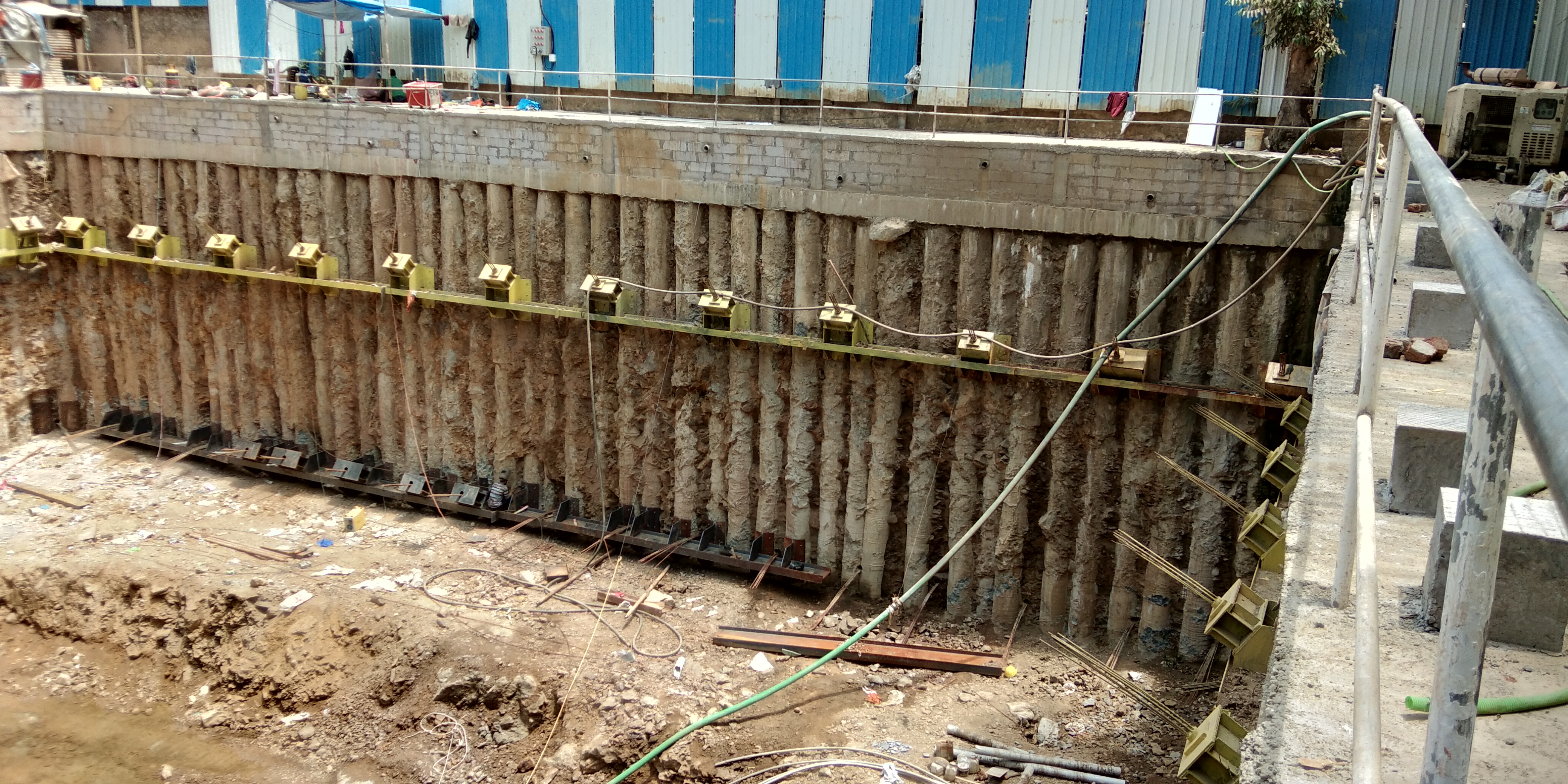Pile shoring system at an excavation site