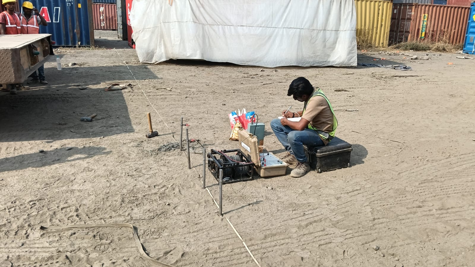Technician carrying out work with field equipment